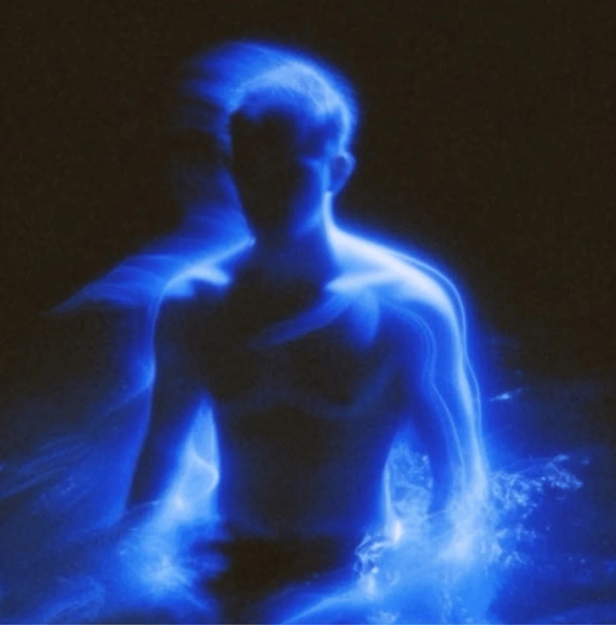 A figure formed from blue light